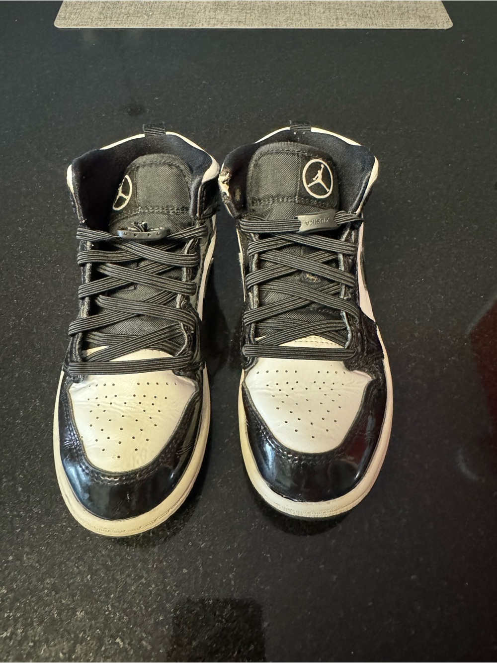 Jordan Black and White High-Top Sneakers